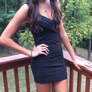 Tight, black, short dress